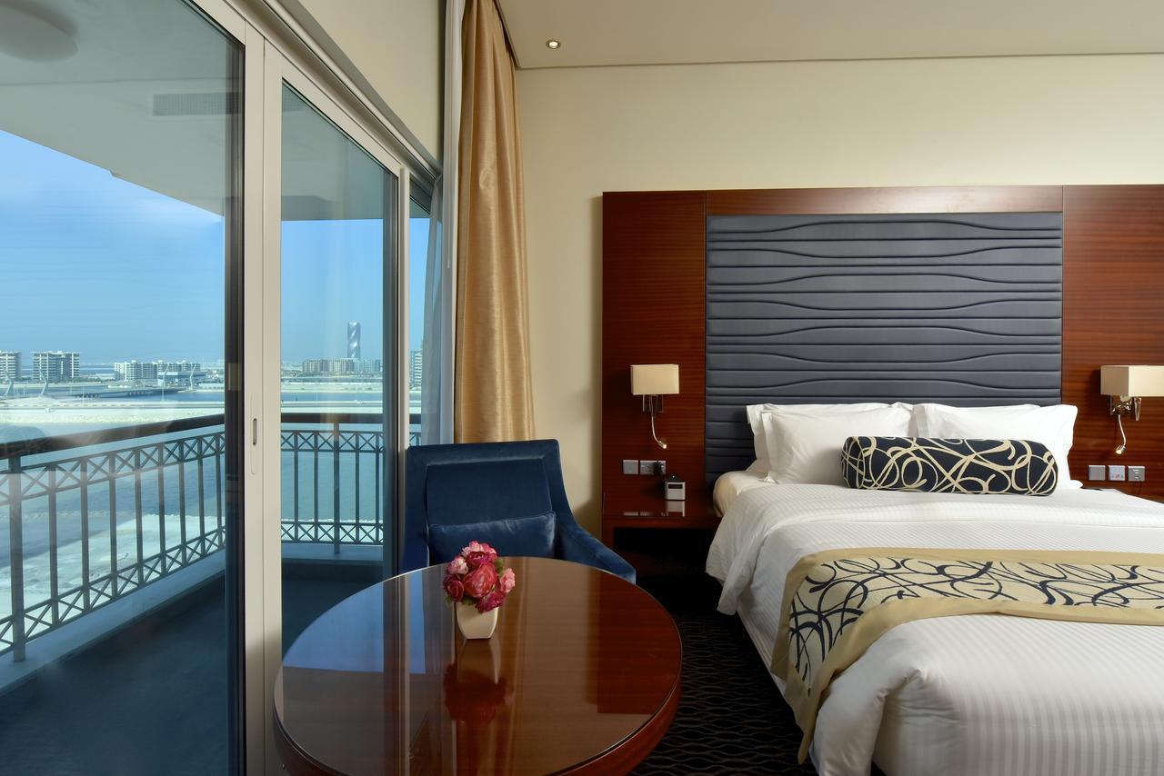 Ramada By Wyndham Manama City Centre Экстерьер фото