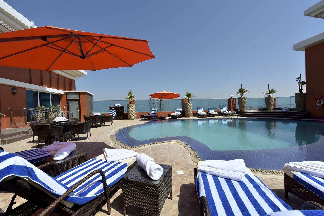 Ramada By Wyndham Manama City Centre Экстерьер фото